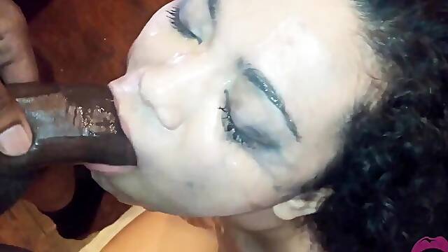 Amateur brunette in black fishnet lingerie sucks big cock