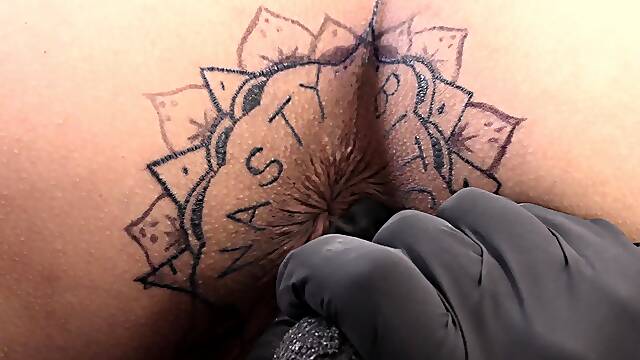 Kitty Jaguar gets a tattoo on her asshole
