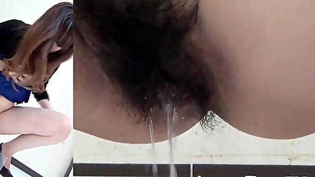 Japanese babe pissing hard with hairy pussy