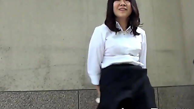 Shy Japanese schoolgirl pisses her pants in public